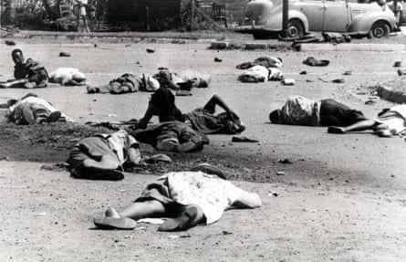 b/w image of bodies strewn across ground