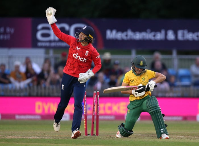 England’s Amy Jones celebrates after stumping South Africa’s Anneke Bosch.