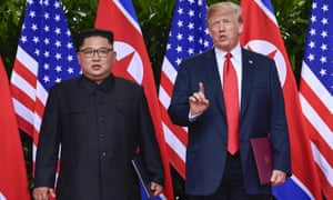 Donald Trump makes a statement before saying goodbye to Kim Jong-un in Singapore on 12 June.