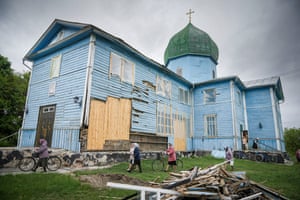 Kyiv: Parishioners leave a service in the bomb damaged Church of the Nativity of the Blessed Virgin