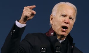 Joe Biden addresses a drive-in rally in Michigan this week.
