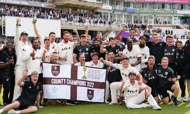Surrey celebrate winning the County Championship Division One title at the Oval.