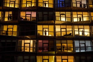 26 March – Residents in Manchester, England, taking part in the Clap For Our Carers campaign, people across the UK applauding NHS workers from the doorsteps, balconies or windows of their homes, in order to say thank you for all of their hard work dealing with the Covid-19 coronavirus pandemic.