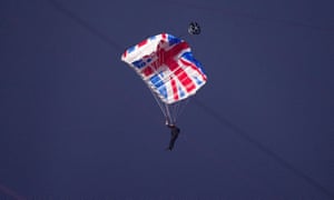 Mark Sutton, the man who parachuted into the London Olympics stadium dressed as James Bond, was killed wingsuit flying in the Swiss Alps in 2013.