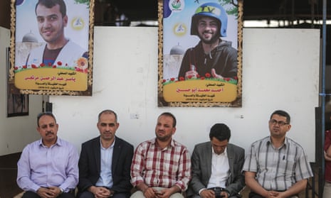 Images of press members Yaser Murtaja (top left) and Ahmad Abu Hussein (top right), who were shot dead by Israeli soldiers while covering border demonstrations, are displayed at an exhibition organised by the Palestinian Media Community in Gaza City last week