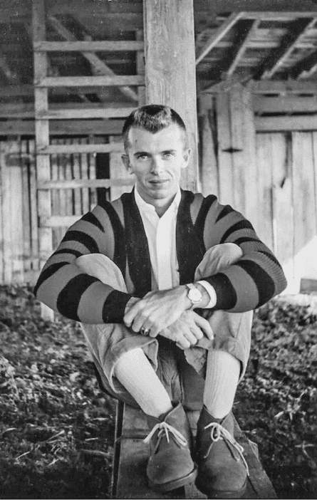 A young man in 50s-era clothes and hair style..