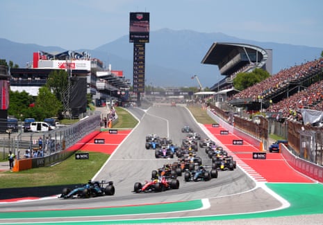 George Russell leads into the first corner during the race at the Circuit de Barcelona-Catalunya.