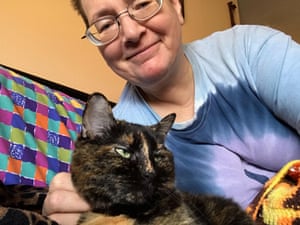 Paula Buckner, self isolating at home with one her two cats, Autumn.