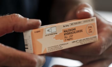 Close-up of naloxone held by person in hands