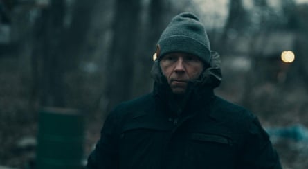 Greg Squire walking in the woods near his home in New Hampshire.