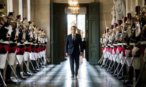 French President Emmanuel Macron walks through the Galerie des Bustes (Busts Gallery) to access the Versailles Palace’s hemicycle for a special congress gathering both houses of parliament