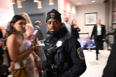 A police officer walks through the lobby of the Washington Hilton after shots were heard during the White House Correspondents’ Dinner in Washington, DC, on 25 April, 2026.