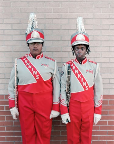 two girls in Jenkins marching band livery