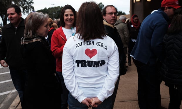Donald Trump supporters wait to hear him speak at the Mississippi Coast Coliseum in January.