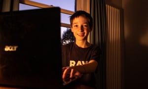 Raphael Wreford, 13,at his computer at home