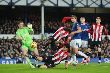 Jordan Pickford of Everton is fouled by Christian Norgaard of Brentford leading to a red card at Goodison Park