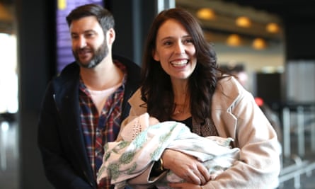 Jacinda Ardern with her partner, Clarke Gayford, and baby Neve at Wellington airport