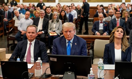 Former president Donald Trump sits in the courtroom at New York supreme court