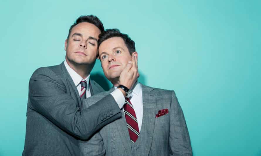 Entertainers Ant (on left) and Dec, heads together
