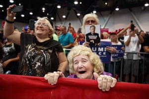 Supporters of President Trump cheer him during a campaign rally in Las Vegas, US