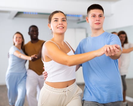 two people in a tango dance class