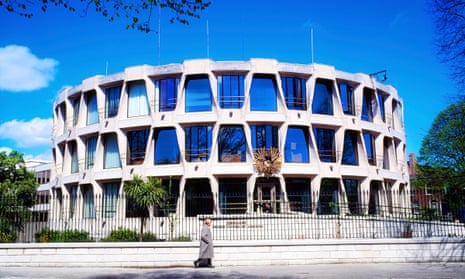 The US embassy in Dublin – circular three-storey modern building framed against blue sky