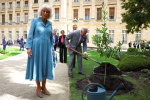 King Charles and Queen Camilla planting a tree in the garden of the City Hall in Bordeaux