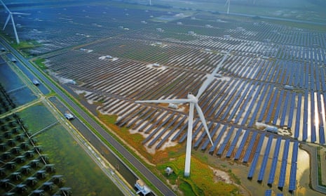 A combined installation of wind turbines and solar panels at Yancheng, Jiangsu province.