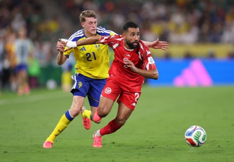 Ali Abdi runs the ball out of play under the watchful eye of Alexander Bernhardsson.