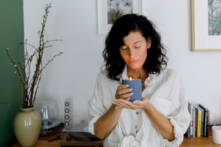 Woman with a scented candle