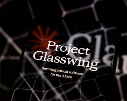 Photo Illustration - Anthropic Launches Project Glasswing, Créteil, France - 08 Apr 2026. The visual for Project Glasswing is displayed on a smartphone screen placed on a reflective surface on to which a Claude logo with hexagonal patterns is projected, in Creteil, France, on April 8, 2026. Anthropic has announced the launch of Project Glasswing, a cybersecurity initiative based on the Claude Mythos model to detect and correct vulnerabilities in critical open-source software.