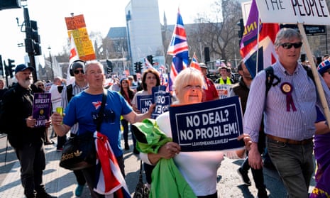 Pro-Brexit demonstrators in Parliament Square, one holding a placard reading 'No deal? No problem!'