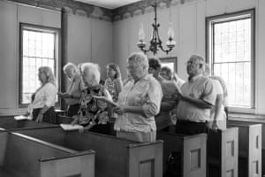 The congregation at the French Road church near Remsen, NY, sing during a small service. Attendance is slowly dwindling, but those left keep alive what tradition they can by singing hymns such as Calon Lân in Welsh, typically finishing with a rendition of Cwm Rhondda