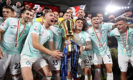 Lautaro Martínez, whose two goals in the final helped Internazionale defend the Coppa Italia, leads the celebrations.