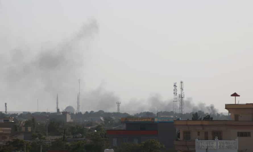Smoke rises during fighting in Sheberghan, Afghanistan