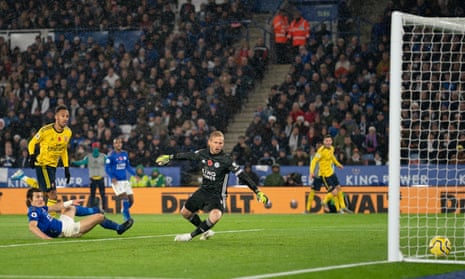 Pierre-Emerick Aubameyang of Arsenal puts the ball past Leicester keeper Kasper Schmeichel but it is disallowed.
