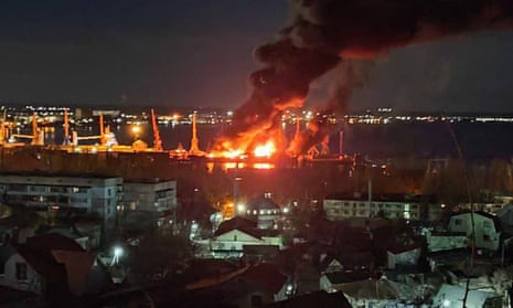 Explosion is seen after Ukraine’s attack on Feodosia port in Crimea.
