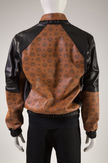 brown and black jacket with repeating MCM logo design