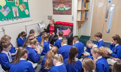 Year six students at St Joseph’s Catholic Academy in Stoke-on-Trent. The school has seen a ‘dramatic’ improvement in reading skills after introducing a daily story time.