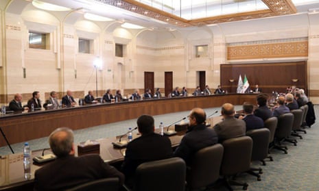 Syria’s new transitional prime minister Mohammad al-Bashir chairing a meeting of the new cabinet in Damascus on 10 December 2024.