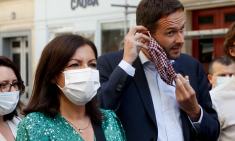 Anne Hidalgo is seen with David Belliard of the Europe Ecologie Les Verts party.