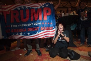 Supporter of Republican candidate Donald Trump, Robin Labani, 50, of Gilbert, Arizona cheers as election results come in during a viewing party at a hotel in downtown Phoenix, Arizona