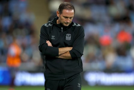 The Coventry manager, Frank Lampard, looks dejected during the Carabao Cup third round defeat by Aston Villa.