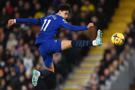 Joao Felix jumps for the ball
