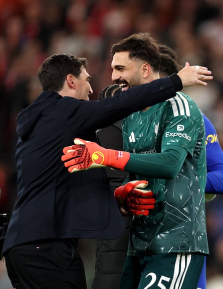 Andoni Iraola embraces his goalkeeper Giorgi Mamardashvili.
