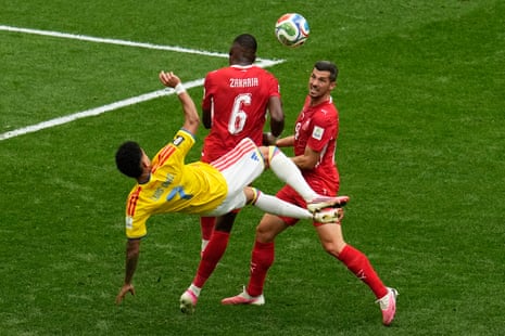 Luis Diaz attempts the spectacular but Zakaria heads the ball away