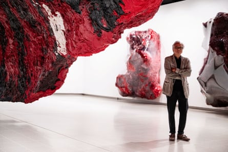 Anish Kapoor next to his installation Mount Moriah at the Gate of the Ghetto