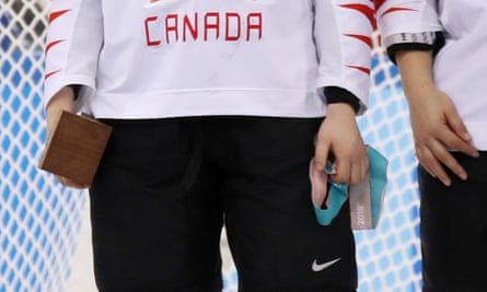 Larocque holding the medal as the USA anthem played during the medal ceremony.