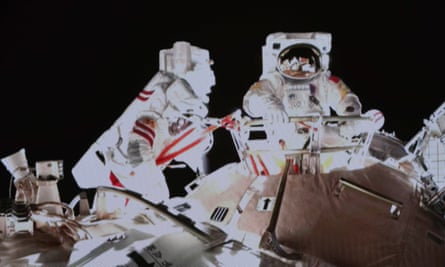 Taikonauts Zhai Zhigang and Wang Yaping undertaking an extravehicular activities (EVA) outside the space station core module Tianhe in November.