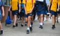 School kids walk to class